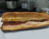 Foto del paso 7 de la receta: Sandwich🥖de jamón🥓🍯, queso🧀y salsa de piña🥐🥯🍍
