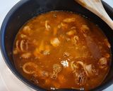 Foto del paso 4 de la receta Fideuá de chipirones, champiñones y gambas