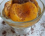 Foto del paso 5 de la receta Melocotones en almíbar con dulce de leche y chocolate