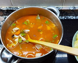Foto del paso 5 de la receta: Guisado de calamarcitos y patatas