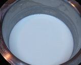A picture of step 2 of Kesariya Mava Rice Kheer.