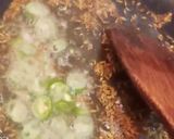 A picture of step 3 of Cooked Eggplant bharta with peas.