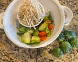 A picture of step 1 of Brussels Sprouts and Enoki Mushroom Soup.