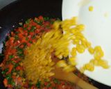 A picture of step 5 of Turmeric fried rice and fried chicken.