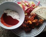 A picture of step 3 of Grilled Chicken Kebabs, salad and wraps with dips.