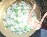 A picture of step 9 of Eggless Doll cake pineappple flavour.