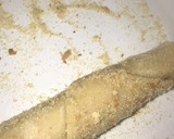 A picture of step 7 of Fishroll with bread crumbs.