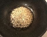 A picture of step 8 of Chicken Arroz Caldo.