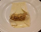 A picture of step 9 of Cheeseburger Egg rolls.