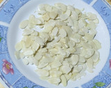 Foto del paso 8 de la receta: Bollo de mandarina y almendras
