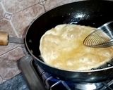 A picture of step 14 of Lahori halwa porri with aalo aur chana bhaaji.