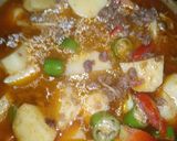 A picture of step 4 of Aloo qeema.