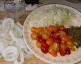Une image de l'étape 2 de Calmars grillés aux tomates cerises et câpres.