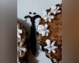 A picture of step 6 of Oreo butterfly cheese cake.
