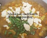 Gambar langkah 6 resipi Bubur Pedas Sarawak.