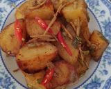Hình bước làm 8 của món Khoai tây um gừng