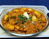 A picture of step 3 of Coconut Chicken Bharta.