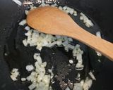 A picture of step 2 of Risotto with fresh salmon fillet and saffron.