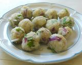 A picture of step 2 of Spicy appam stuffed with masala potato.
