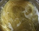 A picture of step 1 of Spaghetti With Tuna & Chicken Sausage.