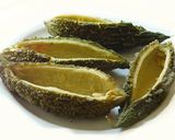 A picture of step 2 of Spicy aromatic nutritious stuffed bitter gourd in tomato sauce.