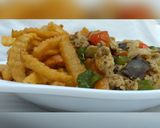 A picture of step 12 of Egg liver sauce with chips.