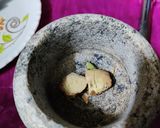 A picture of step 1 of Ginger cardamom milk tea.