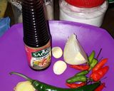 Foto langkah ke 4 dari resep Tumis Bunga Pepaya, Daun Pepaya Jepang, Teri Saos Tiram.
