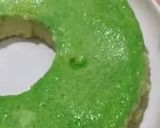 A picture of step 9 of Green Pudding with the hint of coconut powder and Pakola syrup.