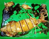 Foto langkah ke 4 dari resep Cumi Buncit Panggang Lada Hitam.