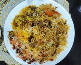 A picture of step 4 of Mutton biryani with boondi and onion cucumber raita.