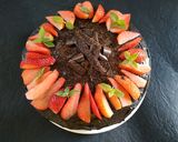 A picture of step 17 of Eggless Layered chocolate strawberry orange cake.