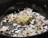 A picture of step 1 of Ghooguni (Spicy White peas curry).