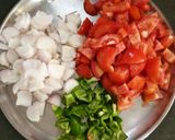 A picture of step 1 of Punjabi Paneer stuffed Capsicum in Red Gravy.