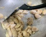 A picture of step 4 of Almonds and cashew nut chicken.