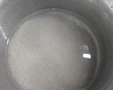 A picture of step 1 of Zeera baghar rice.