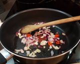 A picture of step 4 of Potato, mushroom and coconut curry pot & coriander tortilla.