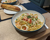 A picture of step 7 of Seafood linguine.