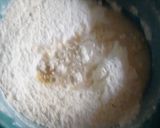 A picture of step 3 of Mahamri (Cardamom and fresh coconut).
