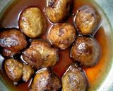 A picture of step 5 of Banana Fritters in Jaggery Syrup.