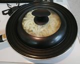 A picture of step 7 of Japanese-Style Stir-Fried Udon with Pork.