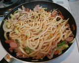 A picture of step 8 of Japanese-Style Stir-Fried Udon with Pork.