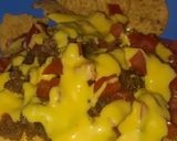 Foto del paso 6 de la receta: Nachos con chicharrón bañados con queso amarillo (De la Ramos)