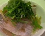 A picture of step 10 of Steamed Grass carp with assorted vegetables in Cantonese style.