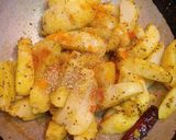 A picture of step 5 of Kumaoni Aloo Gutke with pooris.