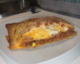 Foto del paso 7 de la receta: Empanada de carne picada boloñesa
