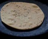 A picture of step 6 of Naan with masala paneer.