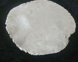 A picture of step 3 of Bajra rotla with sarso ka saag.