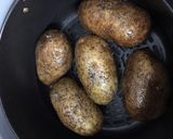 A picture of step 1 of Air Fryer Baked Potato Baked Garlic Parsley Potatoes.