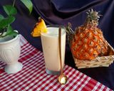 A picture of step 1 of Pineapple Milkshake.